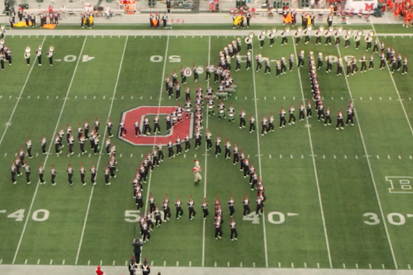 Marching band forms Mary Poppins on the field