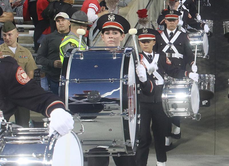 Sarah Wood marching in the ramp entrance in 2019