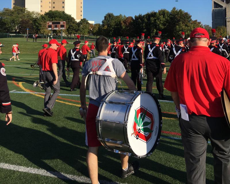 Band members and alumni rehearse for the OSU-UNLV game