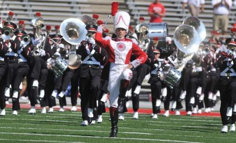 Drum major leads the band at the Spring Game.
