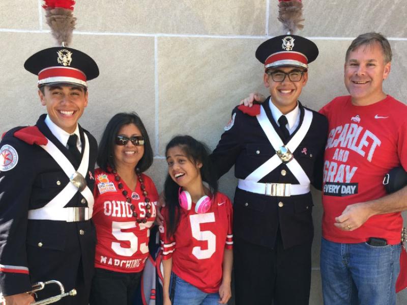 Jeremy and Ryan with their family on a game day
