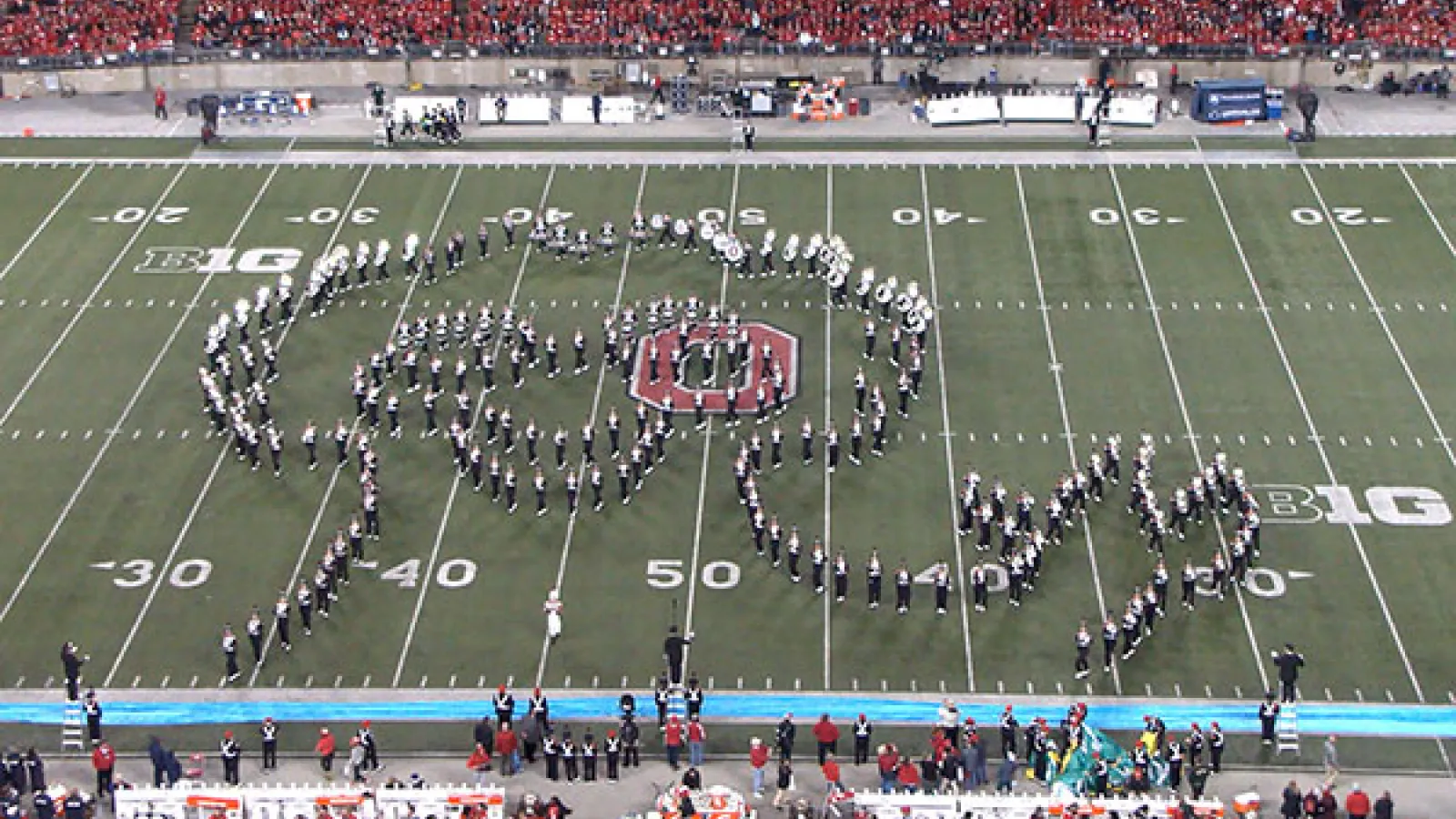 Marching band making a formation of Big Bird on the field