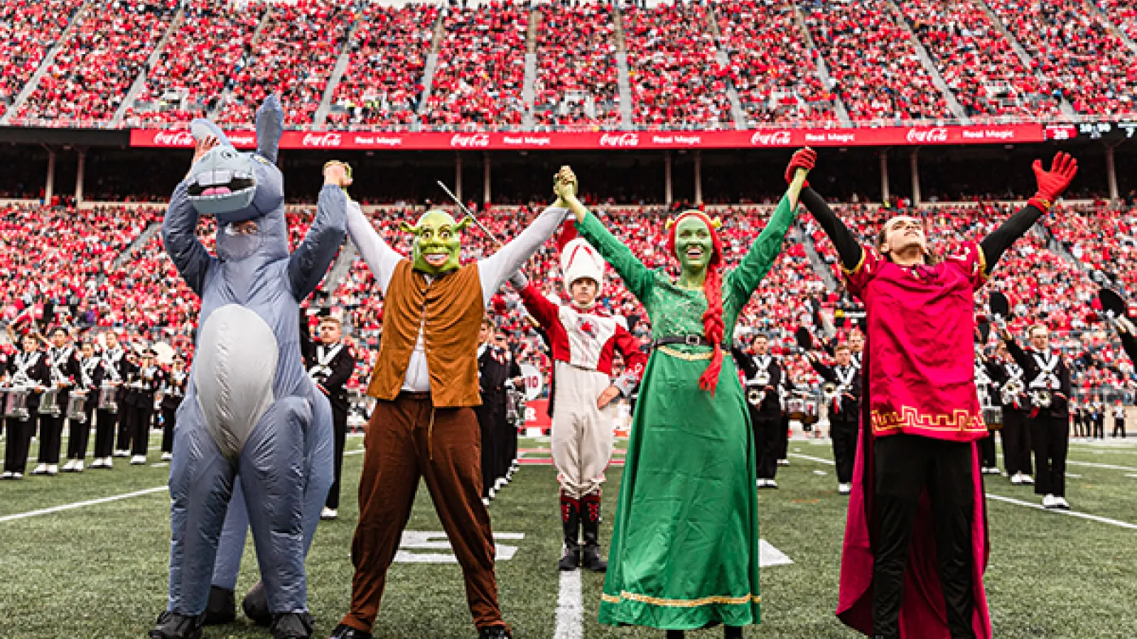 Members of The Ohio State Marching Band dressed as characters from Shrek