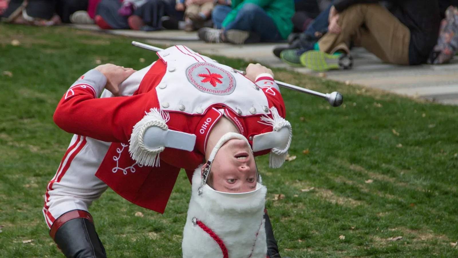 Drum major John LaVange performs a back bend