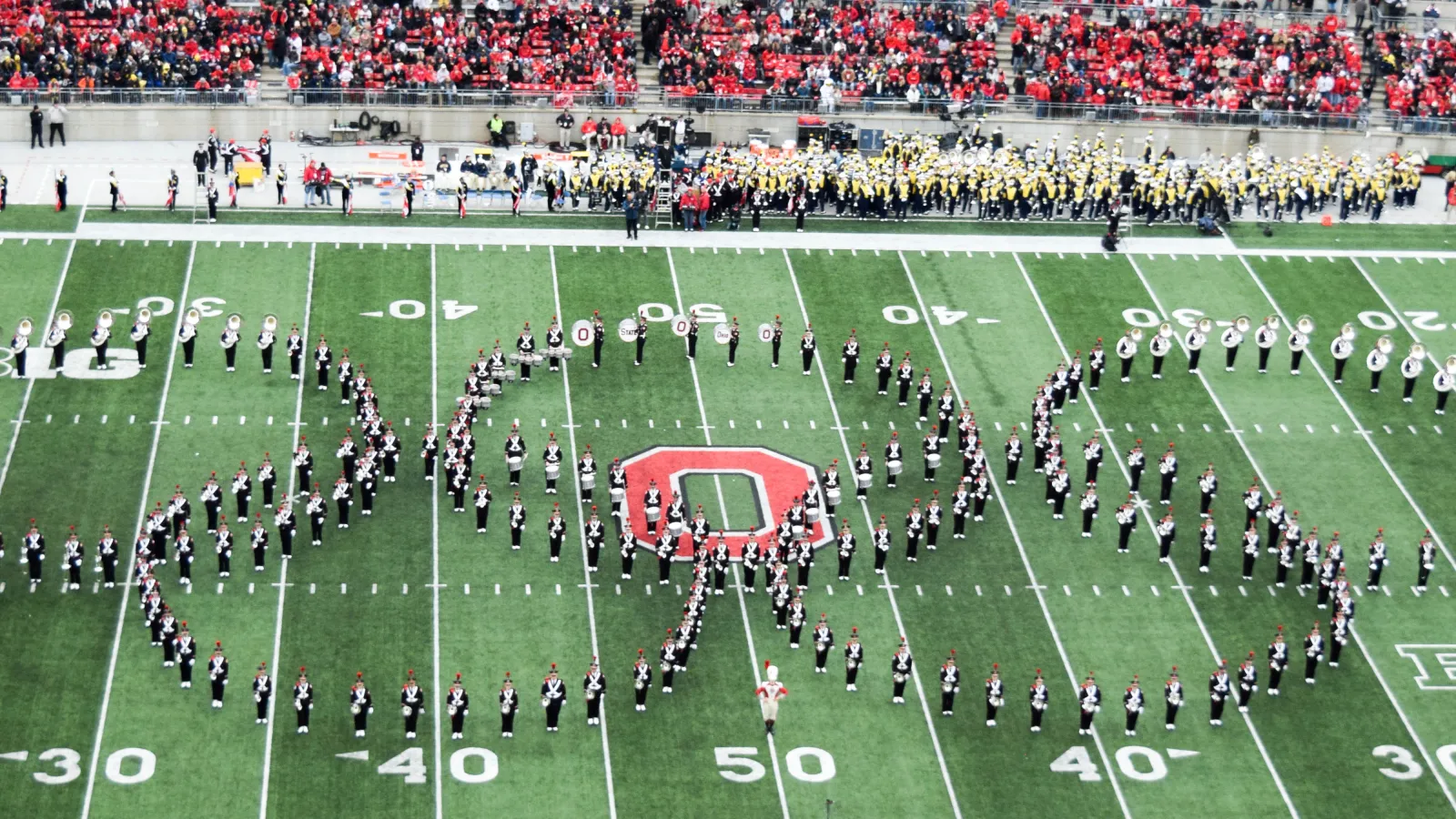 The Ohio State Marching Band marches in "Olympic Spirit" show