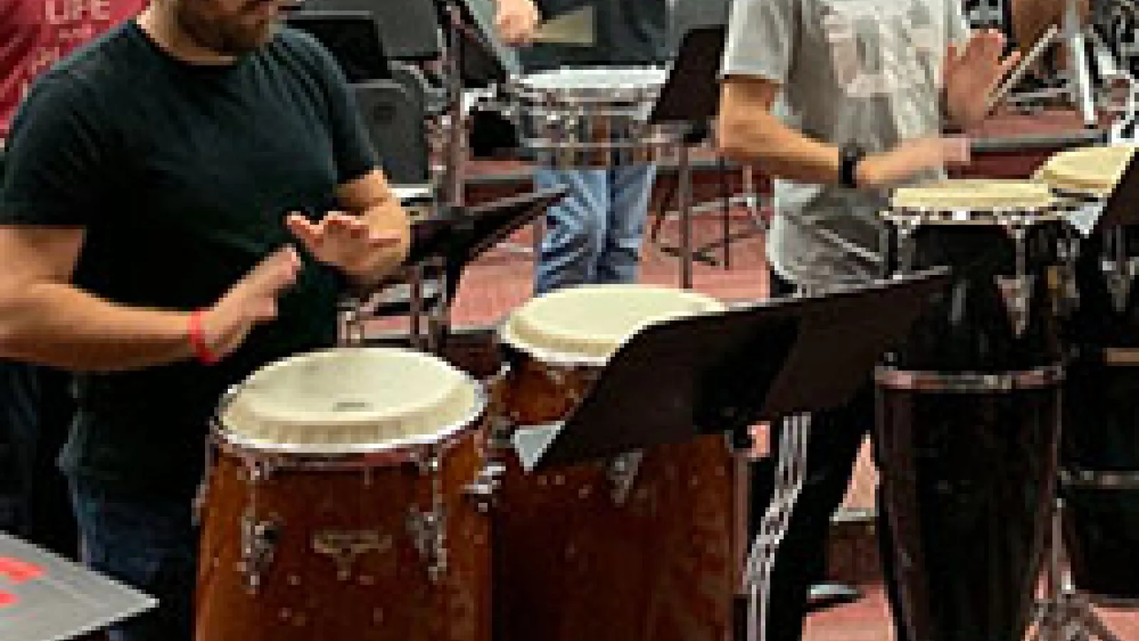 Latin Percussion players rehearse for Saturday's Santana halftime show