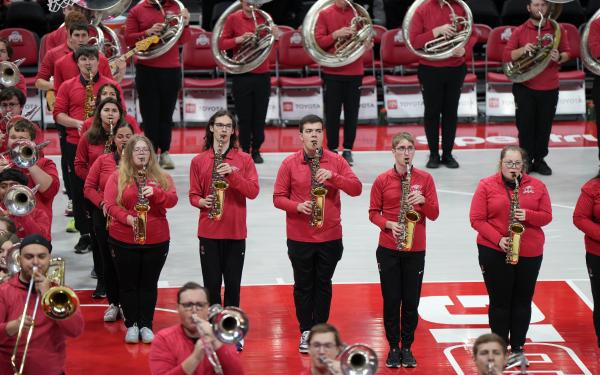 Saxophone Members playing at a Basketball game