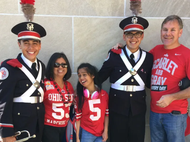 Jeremy and Ryan with their family on a game day