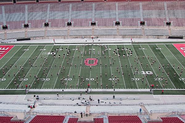 TBDBITL in formation during "Hindsight is 2020" halftime show