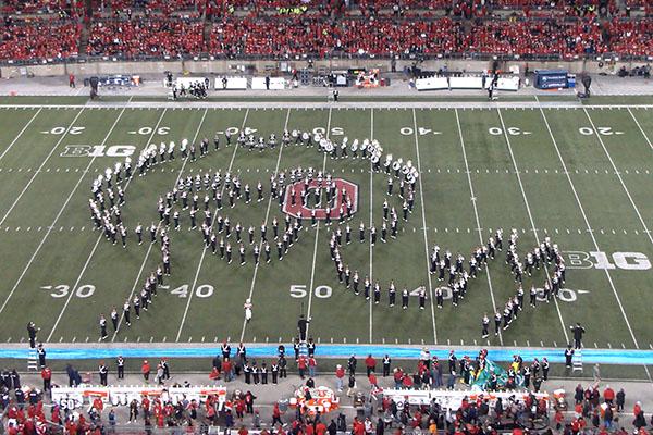 Marching band making a formation of Big Bird on the field