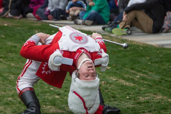 Drum major John LaVange performs a back bend