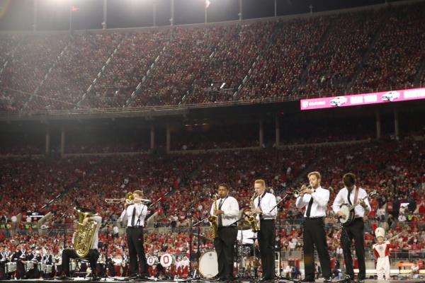 Jazz musicians perform with TBDBITL at halftime