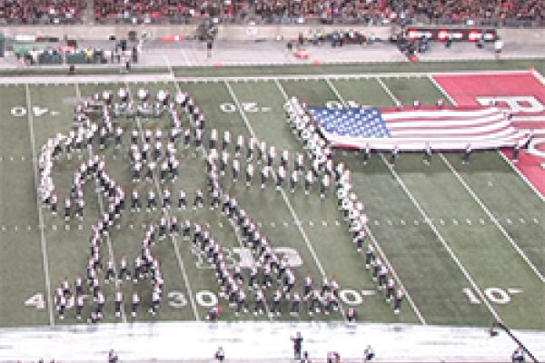 One Giant Leap Flag The band forms an astronaut planting the American Flag in the moon