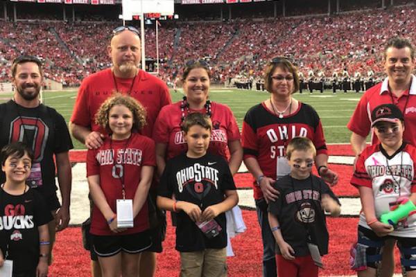 Special Spectators pose for a photo on the field