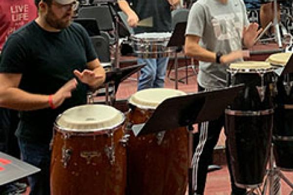 Latin Percussion players at the rehearsal hall Latin Percussion players rehearse for Saturday's Santana halftime show