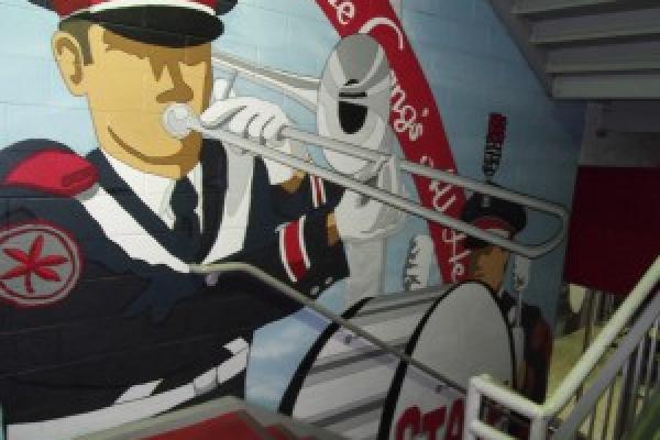 OSU Band Mural by artist Matt Adams appears in the stairwell leading to the Joan Zeig Steinbrenner Band Center.